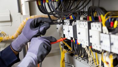 Electrician rewiring a house in Melbourne